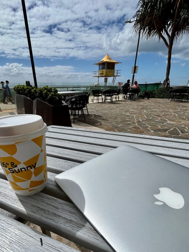 Laptop lifestyle working remotely by the beach 